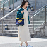 ニットバッグ | チェックのブランケットの上の猫